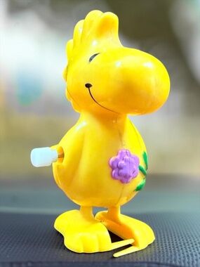 1965, 1972 UNITED FEATURE SYNDICATE INC Woodstock Wind-Up Walker Toy